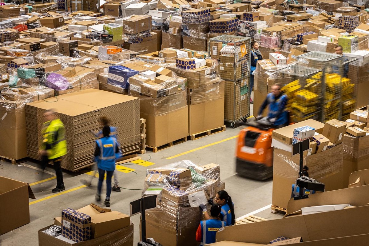 DHL eCommerce workers in a Dutch warehouse