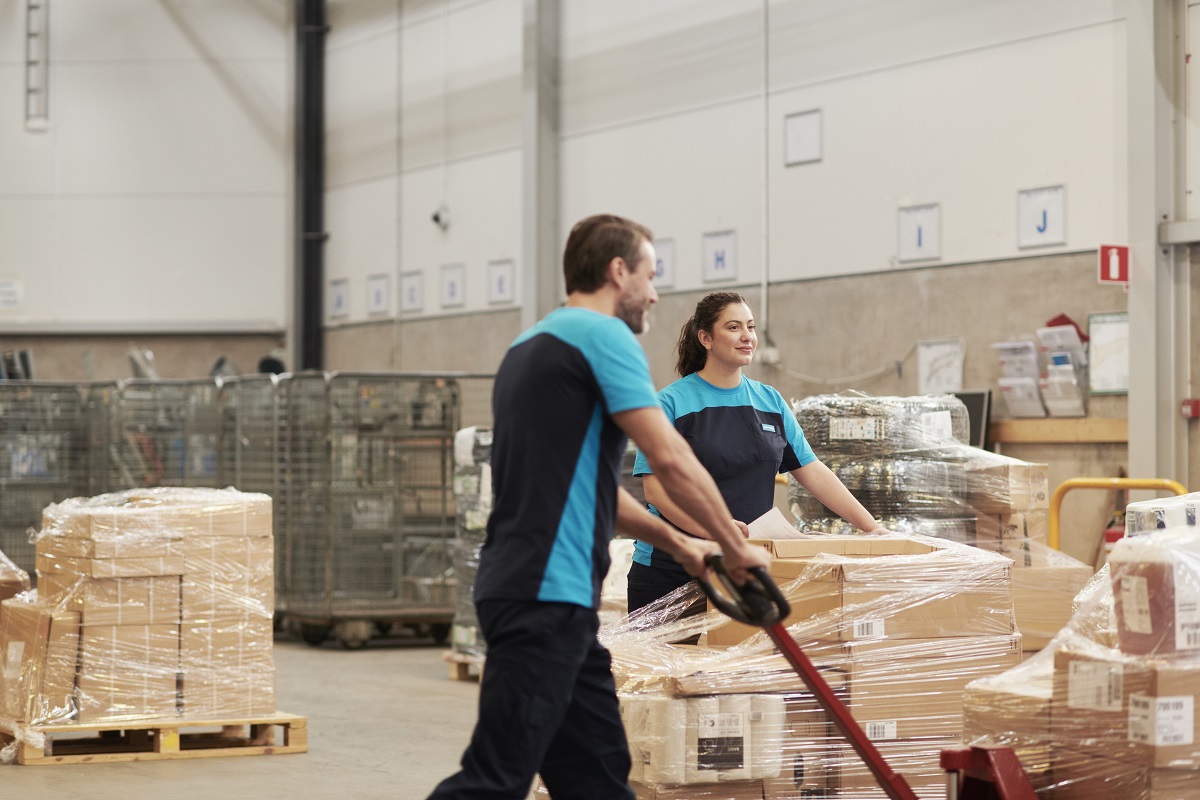 PostNord workers in warehouse